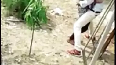 Indian lovers caught making out outdoor in backyard in Desi mms video