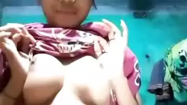 Desi teeny exposes big XXX boobs and plays with them in a sexy way