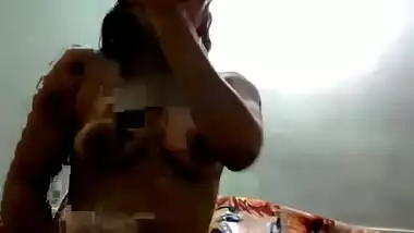 Masked Indian chick in green panties acts on webcam instead of porn