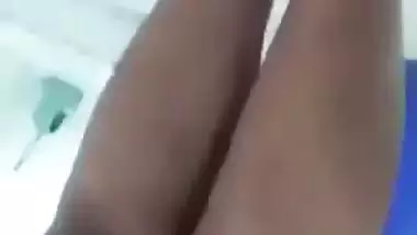 Beautiful desi girl lifting top to reveal sexy boobs