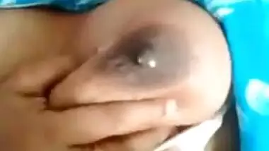 Desi Bhabhi's milking tits exposed in the close-up self-made XXX video