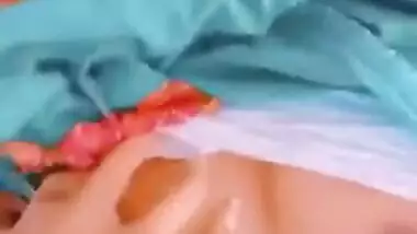 Desi wife shows off small breasts and hairy cunt in online XXX show