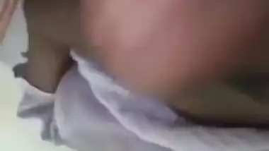Young gal demonstrates the way she likes fingering her Desi XXX cunt
